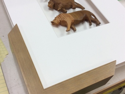 framed carvings